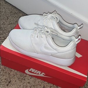 All white Nike Roshe Runs